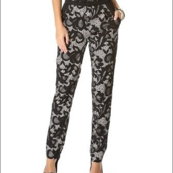 DVF SHANY BLACK LACE JUMPSUIT 6. Bought on Poshmark but it sadly does not fit. - Picture 5 of 12